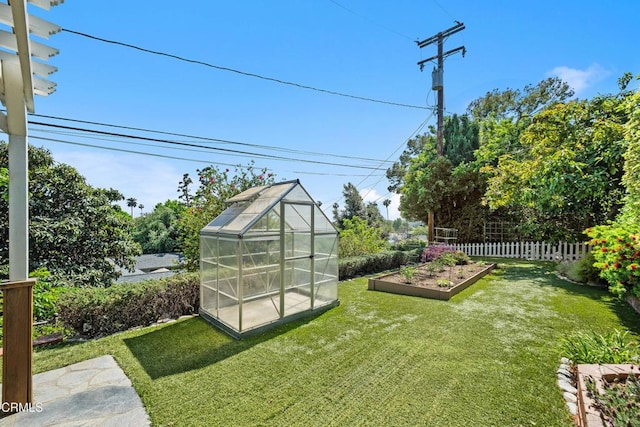 1421 Oneonta Knl, South Pasadena, CA 91030 - view of yard with a vegetable garden, an exterior structure, and an outbuilding