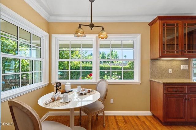 1421 Oneonta Knl, South Pasadena, CA 91030 - dining area with light wood-style floors, baseboards, and ornamental molding