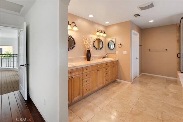 7659 Balasiano Ave, West Hills, CA 91304 - bathroom with recessed lighting, double vanity, and baseboards