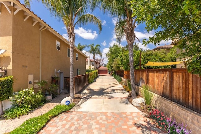 7659 Balasiano Ave, West Hills, CA 91304 - view of side of property featuring stucco siding