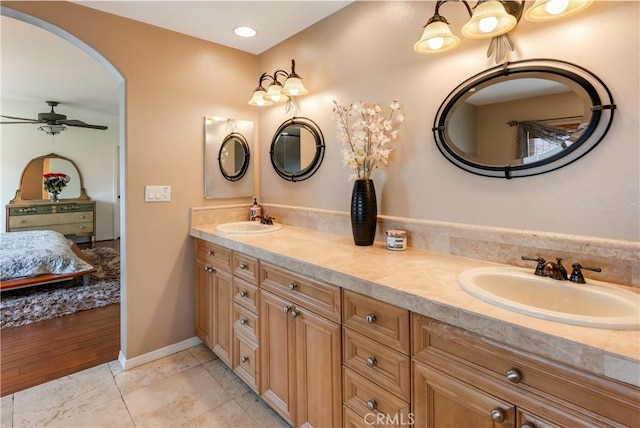 7659 Balasiano Ave, West Hills, CA 91304 - full bathroom featuring connected bathroom, a ceiling fan, double vanity, recessed lighting, and baseboards