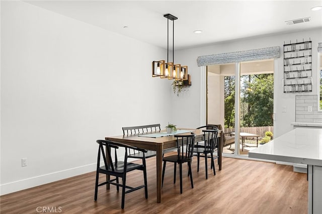 5755 Fickett Ln, Paradise, CA 95969 - dining room featuring wood finished floors, baseboards, recessed lighting, and a chandelier
