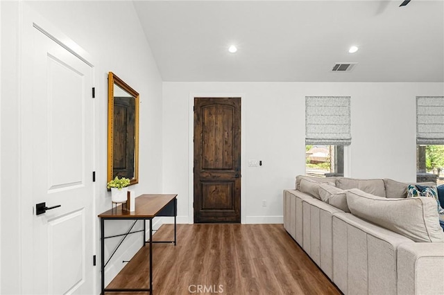 5755 Fickett Ln, Paradise, CA 95969 - living area featuring wood finished floors, baseboards, recessed lighting, and lofted ceiling