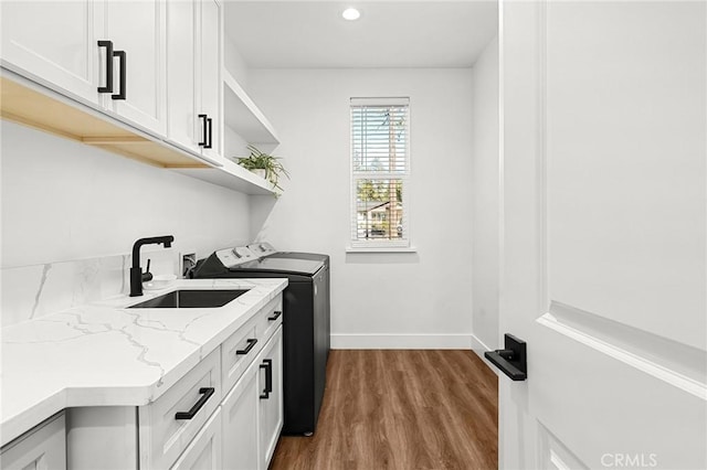 5755 Fickett Ln, Paradise, CA 95969 - laundry room featuring washer and clothes dryer, cabinet space, wood finished floors, recessed lighting, and baseboards