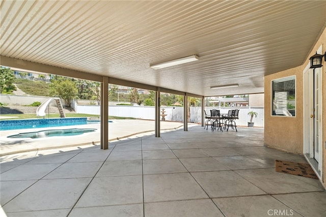 25 Del Brienza, Lake Elsinore, CA 92532 - view of patio / terrace with an outdoor hot tub and outdoor dining area
