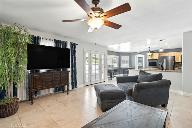 25 Del Brienza, Lake Elsinore, CA 92532 - living area featuring light tile patterned floors, a ceiling fan, and recessed lighting