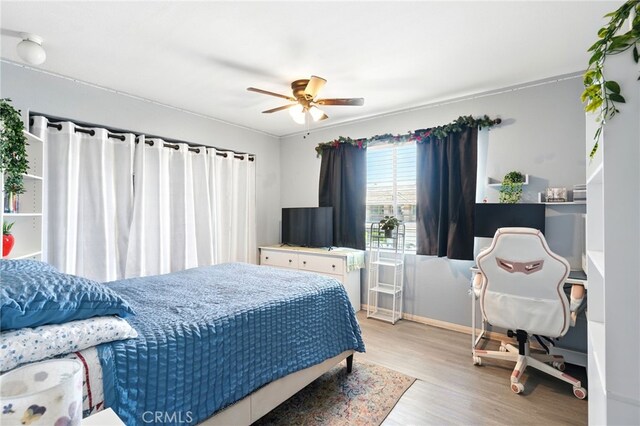 25 Del Brienza, Lake Elsinore, CA 92532 - bedroom featuring wood finished floors and a ceiling fan
