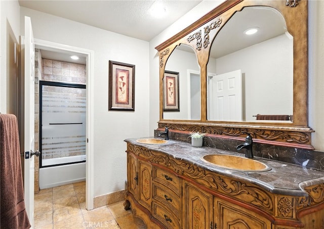 25 Del Brienza, Lake Elsinore, CA 92532 - full bathroom with double vanity and shower / bath combination with glass door