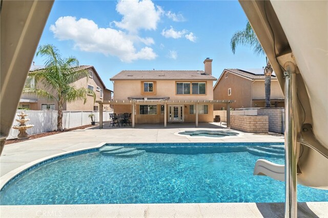 25 Del Brienza, Lake Elsinore, CA 92532 - view of swimming pool featuring an in-ground hot tub, a patio, a pergola, a fenced backyard, and a water slide