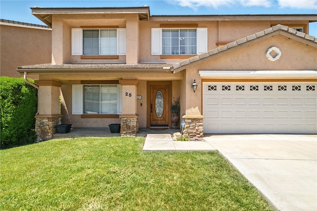 25 Del Brienza, Lake Elsinore, CA 92532 - townhome / multi-family property with stucco siding, concrete driveway, and a front yard