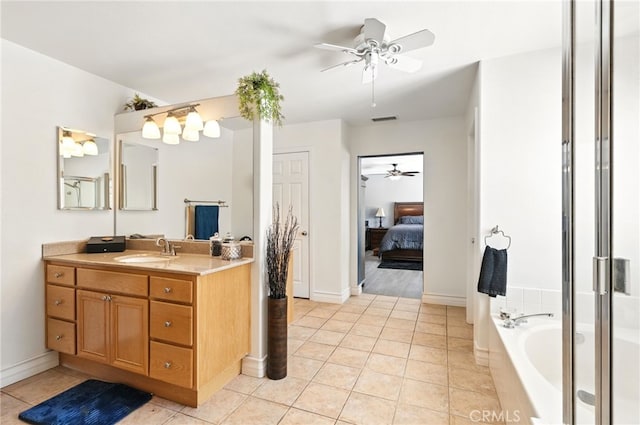 25 Del Brienza, Lake Elsinore, CA 92532 - full bath featuring a ceiling fan, vanity, a garden tub, ensuite bathroom, and tile patterned floors