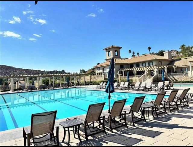 25 Del Brienza, Lake Elsinore, CA 92532 - community pool featuring a patio area
