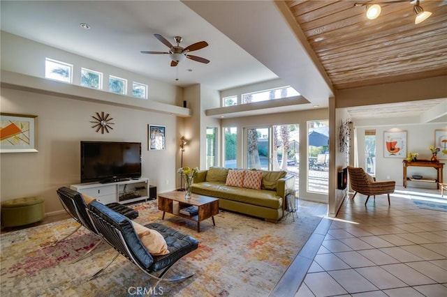 576 E Desert Holly Cir, Palm Springs, CA 92262 - tiled living area featuring ceiling fan and a towering ceiling