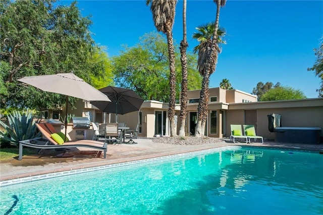 576 E Desert Holly Cir, Palm Springs, CA 92262 - outdoor pool featuring a patio and grilling area