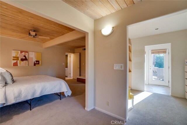 576 E Desert Holly Cir, Palm Springs, CA 92262 - bedroom with carpet flooring, wood ceiling with exposed beams, baseboards, and access to exterior
