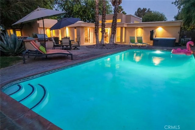 576 E Desert Holly Cir, Palm Springs, CA 92262 - swimming pool featuring a patio area