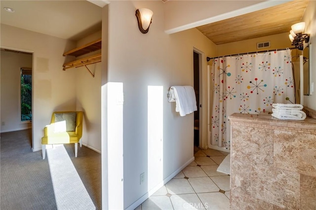 576 E Desert Holly Cir, Palm Springs, CA 92262 - full bathroom with a shower with shower curtain, wood ceiling, and baseboards