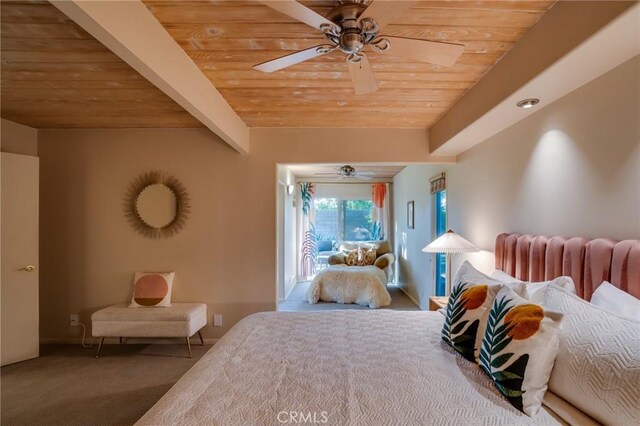 576 E Desert Holly Cir, Palm Springs, CA 92262 - carpeted bedroom with wooden ceiling with exposed beams and ceiling fan