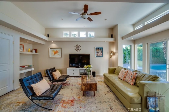 576 E Desert Holly Cir, Palm Springs, CA 92262 - living room featuring healthy amount of natural light, ceiling fan, and recessed lighting