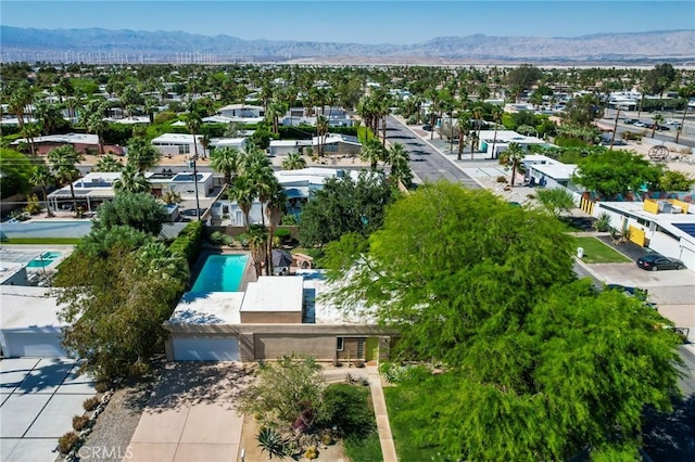 576 E Desert Holly Cir, Palm Springs, CA 92262 - bird's eye view of a mountain backdrop and a pool