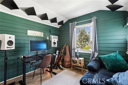 426 Ivy St, Glendale, CA 91204 - office with lofted ceiling, wood finished floors, and wood walls