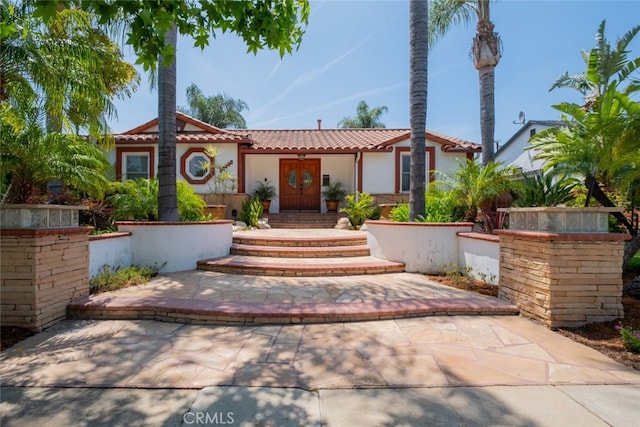16732 Lassen St, Northridge, CA 91343 - mediterranean / spanish-style house featuring a tiled roof and stucco siding