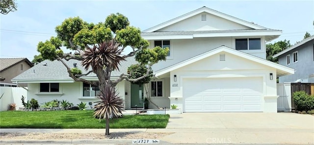 2737 Lorenzo Ave, Costa Mesa, CA 92626 - view of front facade with concrete driveway, a garage, and stucco siding