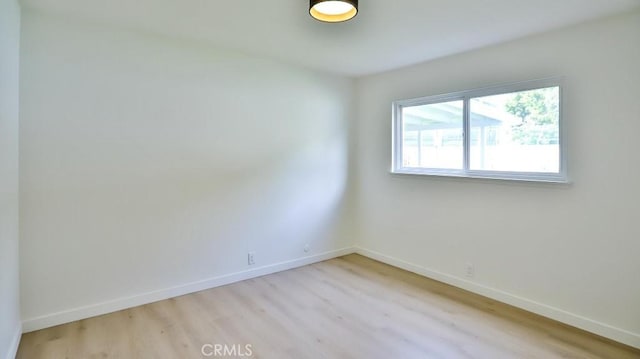 2737 Lorenzo Ave, Costa Mesa, CA 92626 - unfurnished room featuring light wood finished floors and baseboards