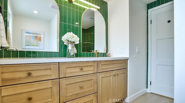 2737 Lorenzo Ave, Costa Mesa, CA 92626 - bathroom with vanity, baseboards, and a tile shower