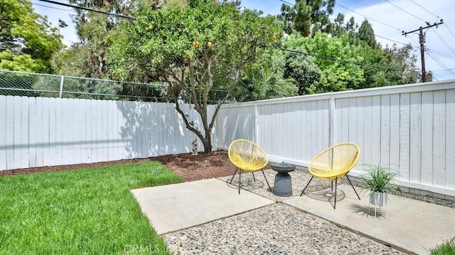 2737 Lorenzo Ave, Costa Mesa, CA 92626 - fenced backyard featuring a patio area