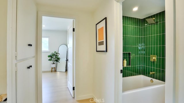 2737 Lorenzo Ave, Costa Mesa, CA 92626 - full bath featuring shower / tub combination, baseboards, and wood finished floors