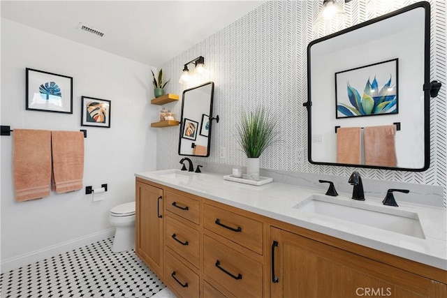 2716 Spreckels, Redondo Beach, CA 90278 - bathroom with double vanity, toilet, and baseboards