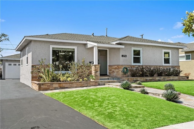 2716 Spreckels, Redondo Beach, CA 90278 - view of front of house featuring stucco siding, stone siding, a front yard, and a garage