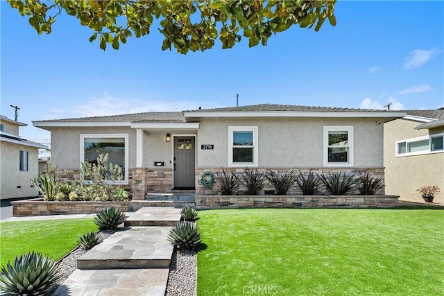2716 Spreckels, Redondo Beach, CA 90278 - view of front facade featuring stucco siding, a front yard, and stone siding