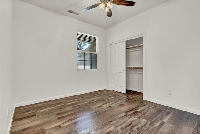 300 S Lombardi St, Porterville, CA 93257 - unfurnished bedroom with wood finished floors, baseboards, a closet, and a ceiling fan