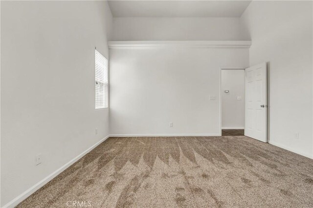 300 S Lombardi St, Porterville, CA 93257 - empty room featuring carpet flooring and baseboards