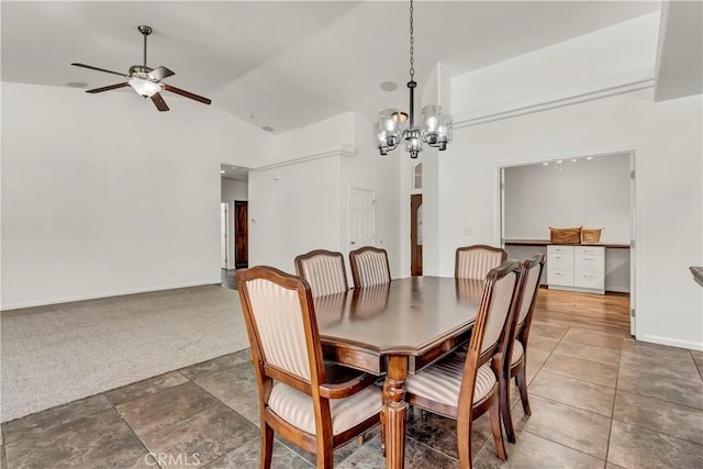 300 S Lombardi St, Porterville, CA 93257 - carpeted dining space with a chandelier, ceiling fan, vaulted ceiling, and baseboards