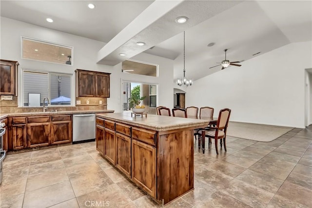 300 S Lombardi St, Porterville, CA 93257 - kitchen with dishwasher, lofted ceiling, a ceiling fan, tasteful backsplash, and a center island