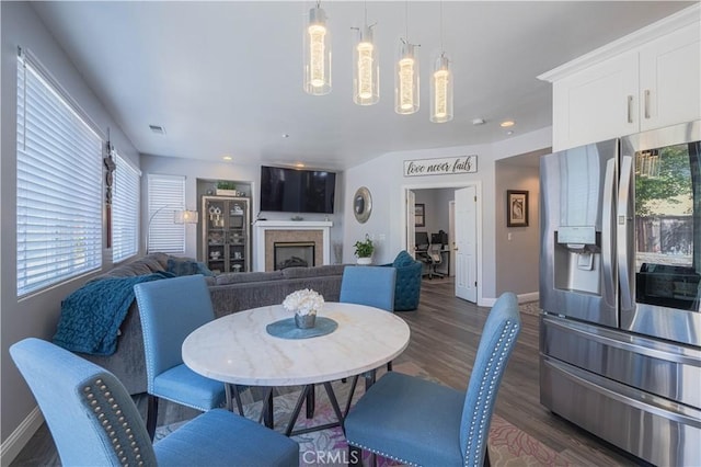 429 Tudor Way, Salinas, CA 93906 - dining room with baseboards, dark wood-style floors, a fireplace, and recessed lighting