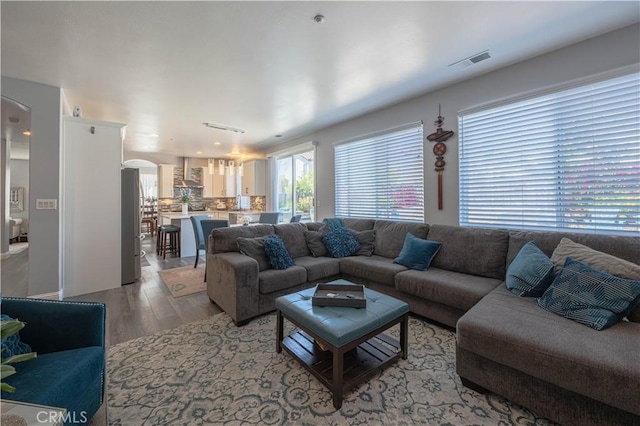 429 Tudor Way, Salinas, CA 93906 - living area with arched walkways and light wood finished floors