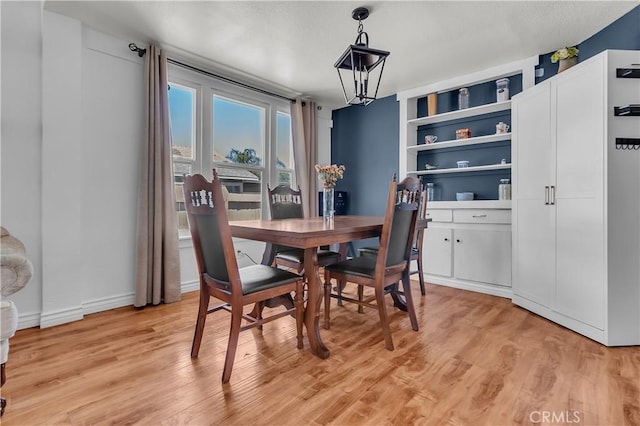 3875 Everest Ave, Riverside, CA 92503 - dining space with light wood-type flooring