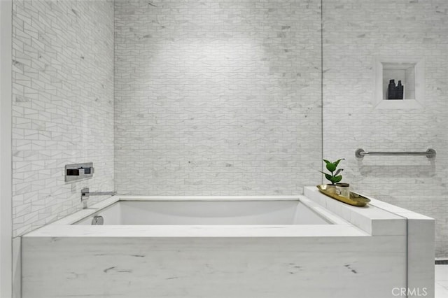 888 W E St Unit 505, San Diego, CA 92101 - bathroom with a garden tub and tile walls