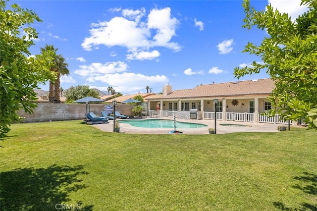 43300 Warner Trl, Palm Desert, CA 92211 - back of house featuring a patio, a chimney, a tile roof, and stucco siding