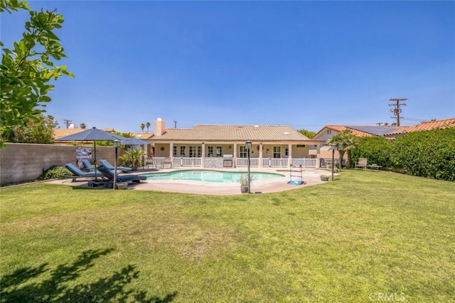 43300 Warner Trl, Palm Desert, CA 92211 - back of property featuring a chimney, a patio, and a tiled roof
