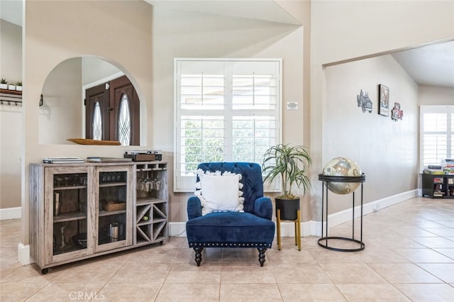 43300 Warner Trl, Palm Desert, CA 92211 - sitting room featuring arched walkways, tile patterned floors, and baseboards