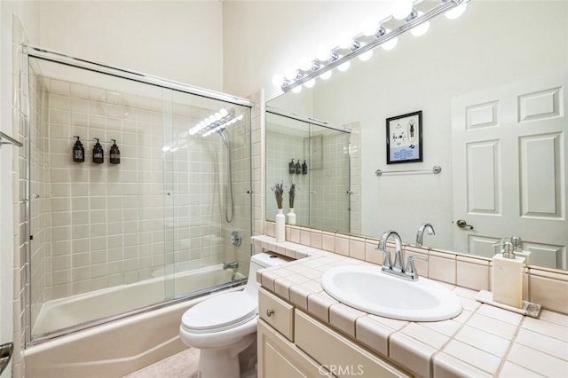 43300 Warner Trl, Palm Desert, CA 92211 - full bath with toilet, shower / bath combination with glass door, and vanity