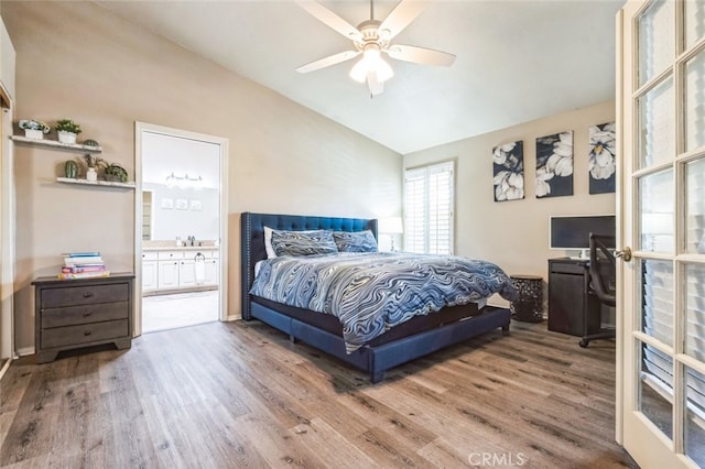 43300 Warner Trl, Palm Desert, CA 92211 - bedroom featuring vaulted ceiling, wood finished floors, ensuite bath, a ceiling fan, and an office area