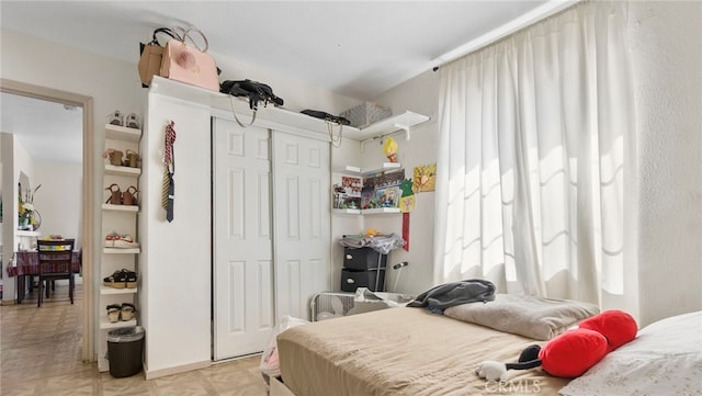 413 E 81st St, Los Angeles, CA 90003 - bedroom with multiple windows and a closet
