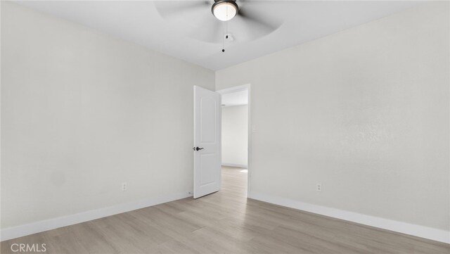 413 E 81st St, Los Angeles, CA 90003 - unfurnished room featuring a ceiling fan, light wood-type flooring, and baseboards