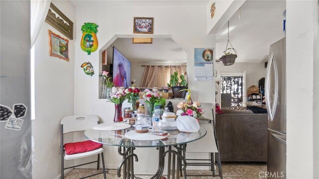 413 E 81st St, Los Angeles, CA 90003 - dining area with tile patterned flooring